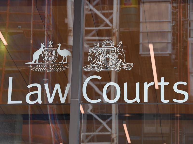 A building tenant has won her appeal against paying $120,000 defamation damages to another resident.