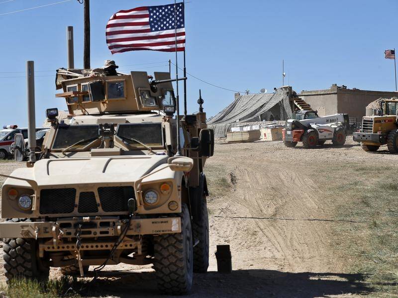 A US military official says the US-led military coalition has begun withdrawing troops from Syria.