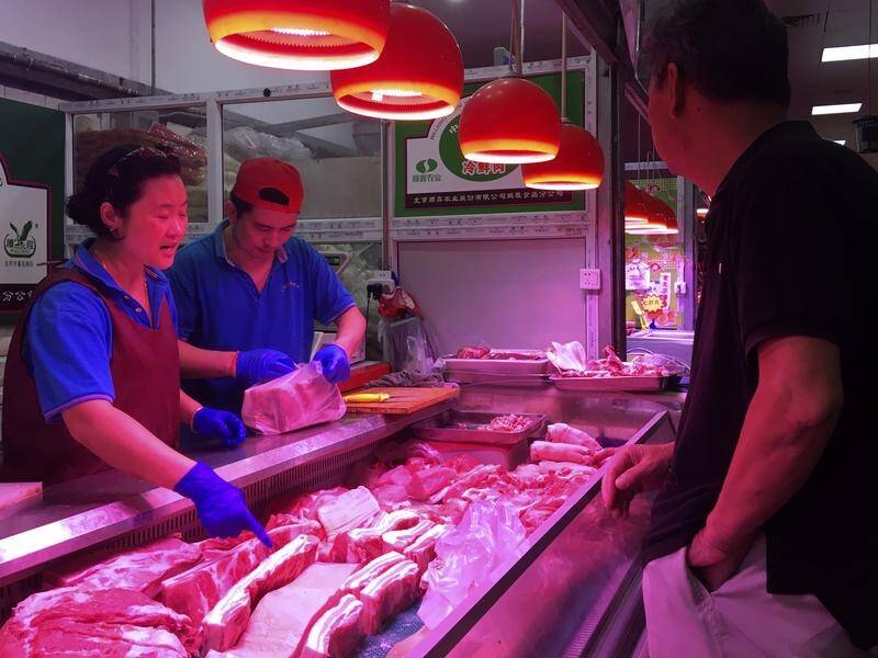 Chinese families are having to rethink menu options as pork prices soar despite government efforts.