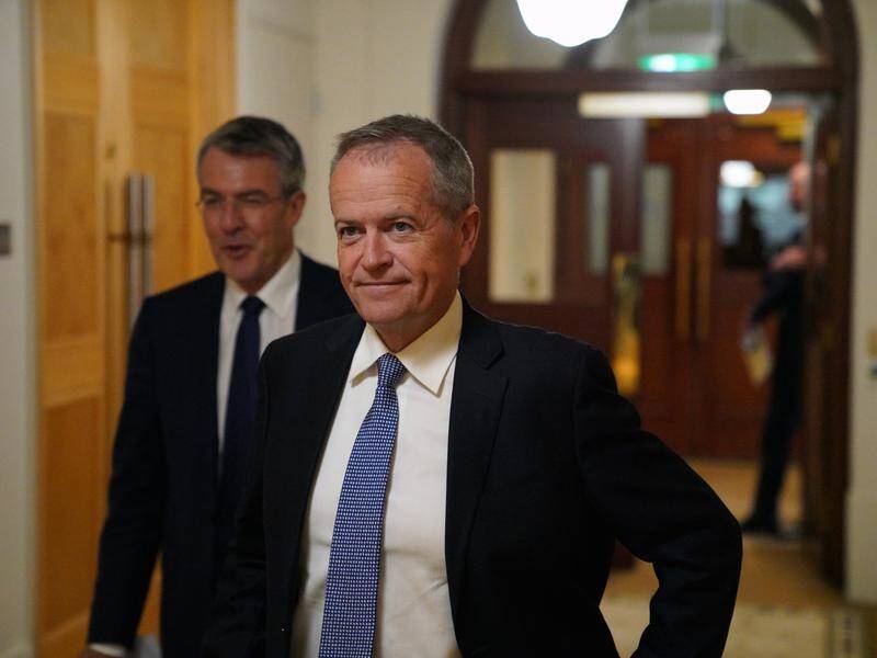 Opposition Leader Bill Shorten (R) has ramped up calls to set up a National Integrity Commission.