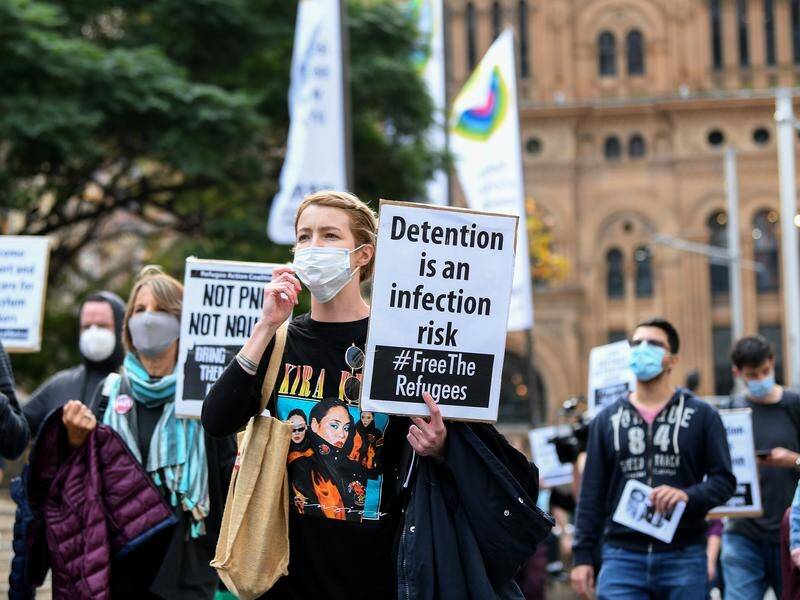 Pro-refugee protesters held a rally in Sydney, ignoring a court order and concerns over COVID-19.