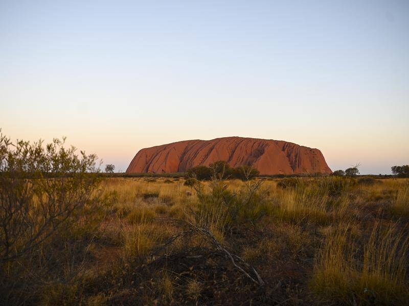 Climbing Uluru will be banned after a fortnight in recognition of local Indigenous people's wishes.