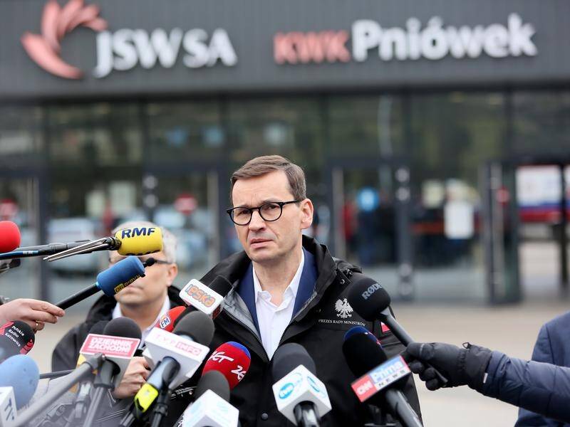 Polish Prime Minister Mateusz Morawiecki says seven people are trapped after fatal mine blasts.