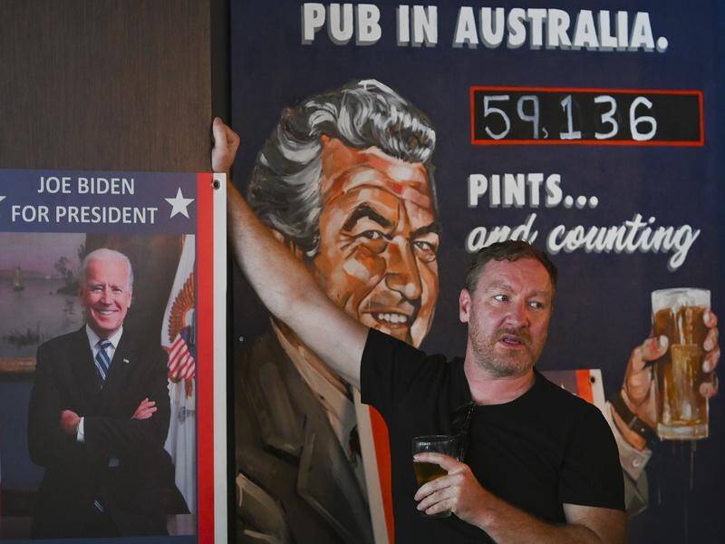 A patron watches US election results at PJ O'Reilly's Bar in Canberra.