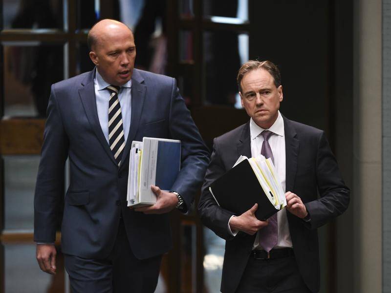Peter Dutton defended Health Minister Greg Hunt over claims he interfered in a independent review.