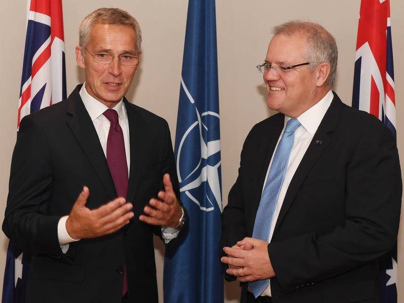 Australia has struck a new deal with NATO during a visit by its secretary-general Jens Stoltenberg.