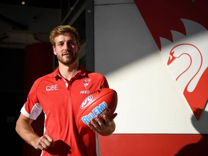 After 12 knee operations, Alex Johnson is ready to return to the AFL for the Swans.