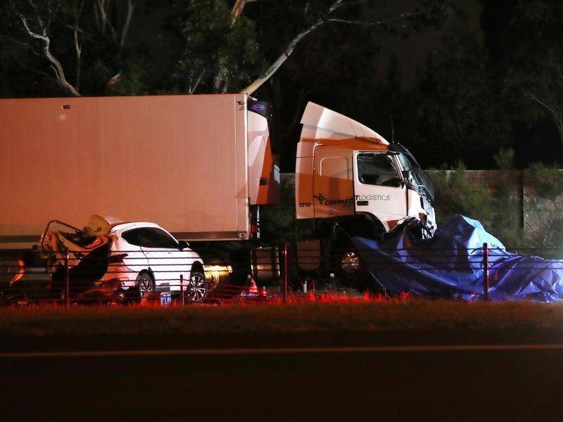 Four constables were killed when a truck ploughed into them as they stood on a Melbourne freeway.