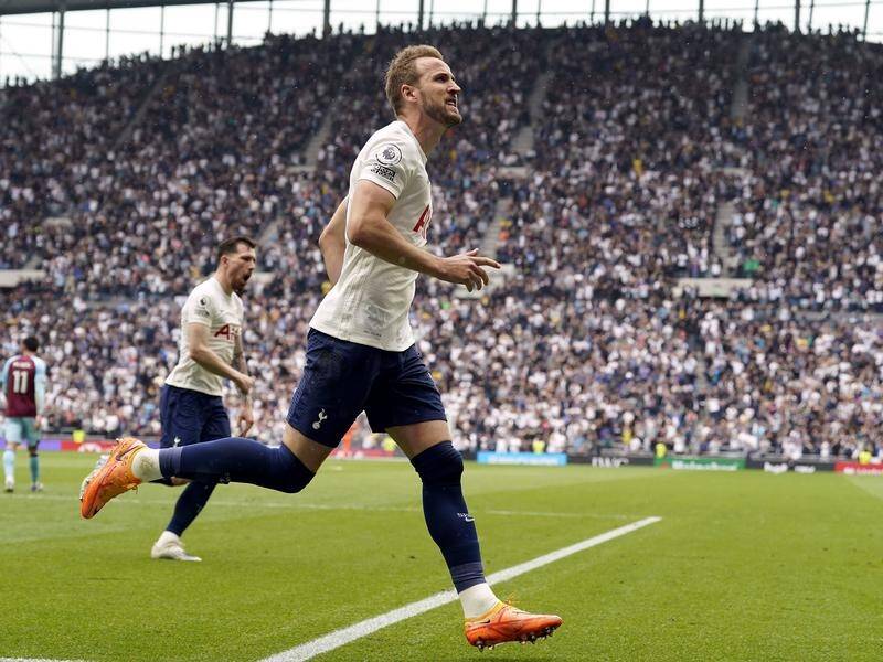 Harry Kane wheels away after scoring Spurs' crucial sport-kick winner against Burnley.