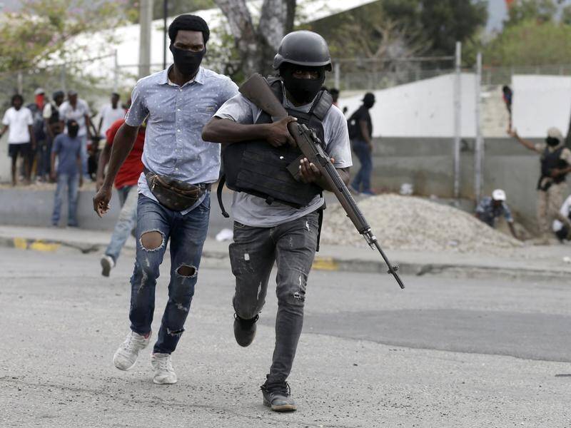 Violence has erupted at Haiti's Carnival as police struggle to win better pay and conditions