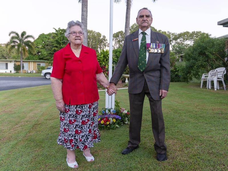 VC recipient Keith Payne and his wife Flo laid an Anzac Day wreath on their front lawn in Mackay.
