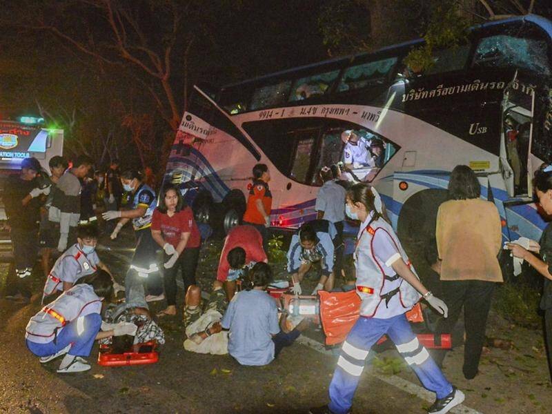 14 people were killed and more than 30 injured when a bus ran off the road in Thailand. (AP PHOTO)