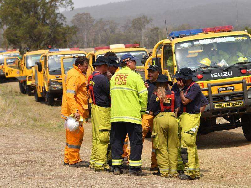 Queensland firefighters will be given a reprieve with dangerous heatwave conditions set to ease.