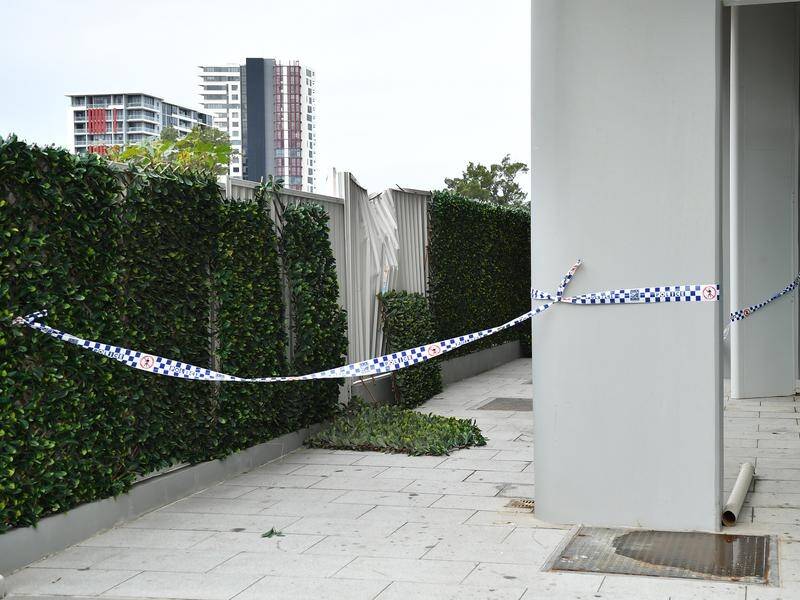 A 23-year-old woman was found fatally injured below an 11-storey unit block in Zetland, Sydney.