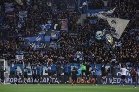 Atalanta and their fans celebrate reaching the final of the Coppa Italia. (EPA PHOTO)
