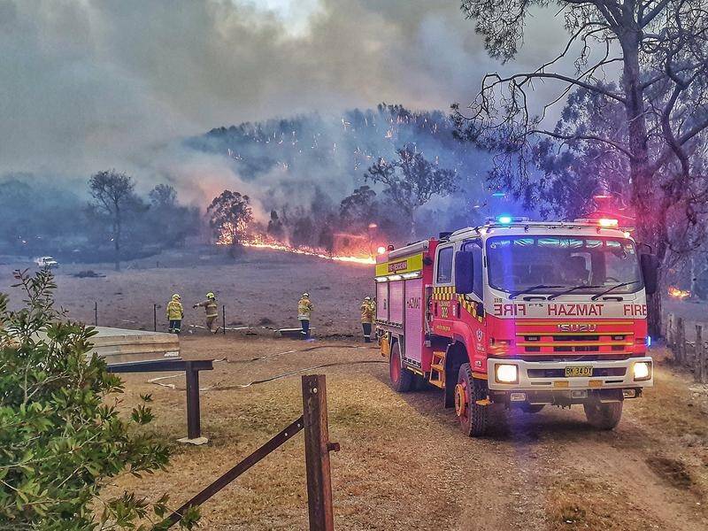 There are 50 bush and grass fires burning up and down the NSW coast and inland to the west.