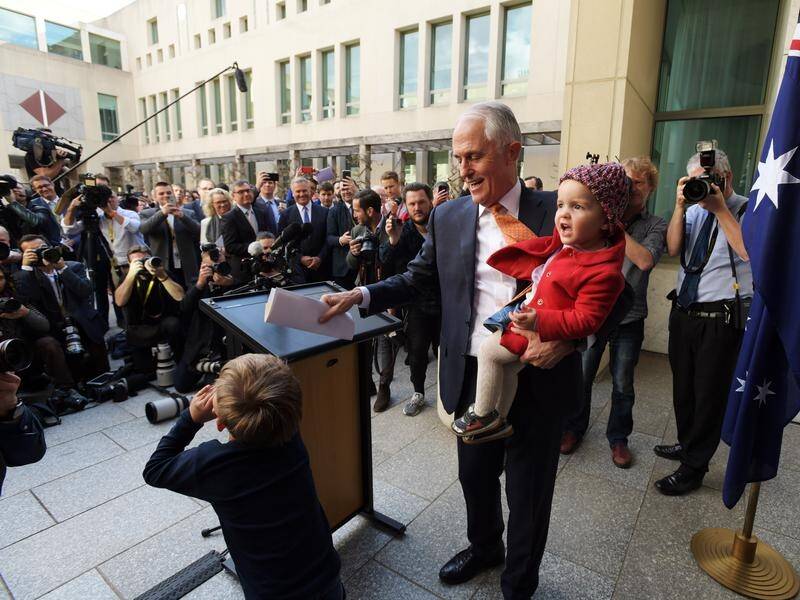 Malcolm Turnbull with his grandchildren at his farewell press conference after being rolled.