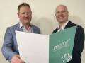 PROGRESS: Henty Respite Trust chair Ben Hooper and Mercy Connect chief executive Trent Dean. The groups have signed a memorandum of understanding for the development of Avondale Place. 
