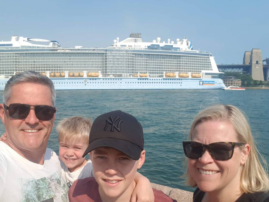 HAPPIER DAYS: Pete, Baxter, 4, Sam, 13, and Karen Rourke, in Sydney with the Ovation of the Seas in the background. Picture: PETE ROURKE