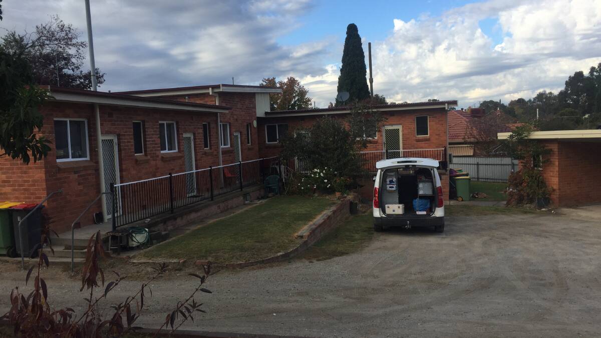 Police at an Albury unit block where a man was found with a gunshot wound to his face at the weekend. Picture: Border Mail