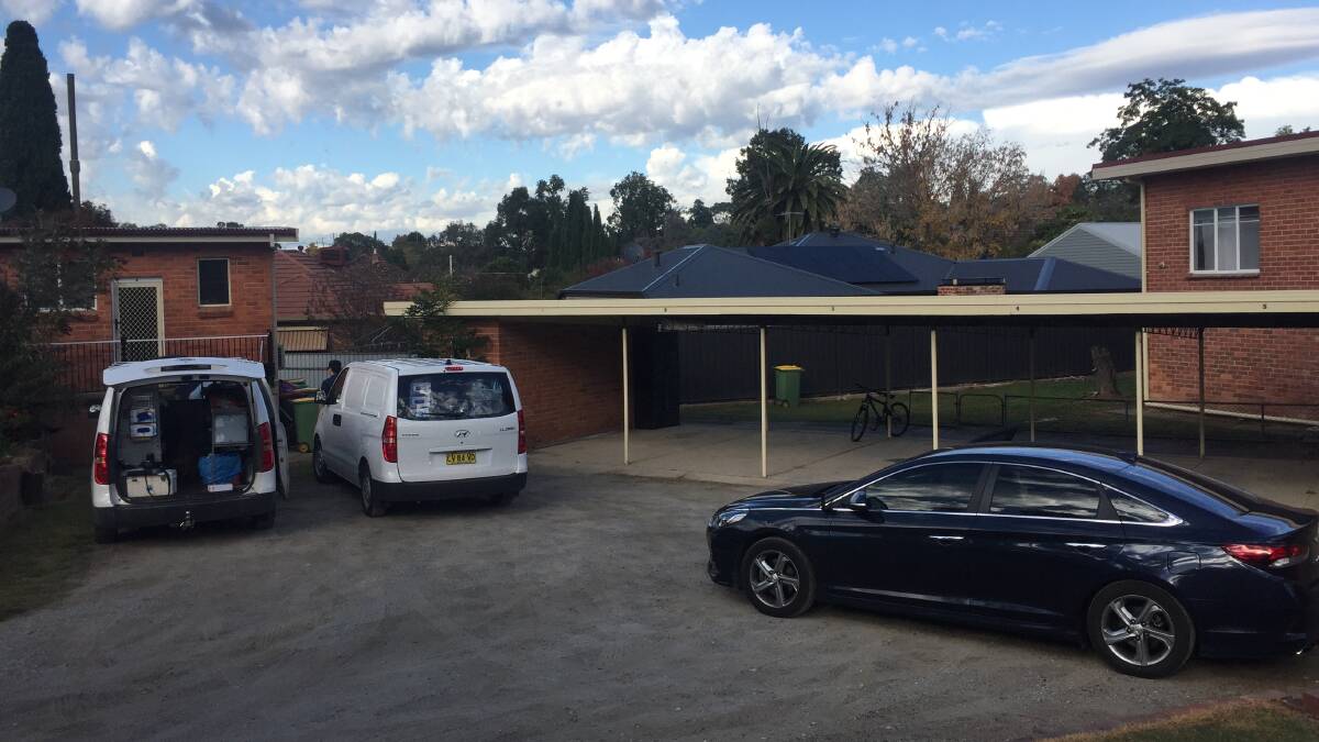 Police at an Albury unit block where a man was found with a gunshot wound to his face at the weekend. Picture: Border Mail