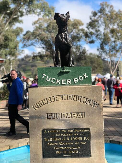 TRIUMPHANT: The Dog on the Tuckerbox's return to its plinth was celebrated on Saturday. Picture: Steph Cooke 
