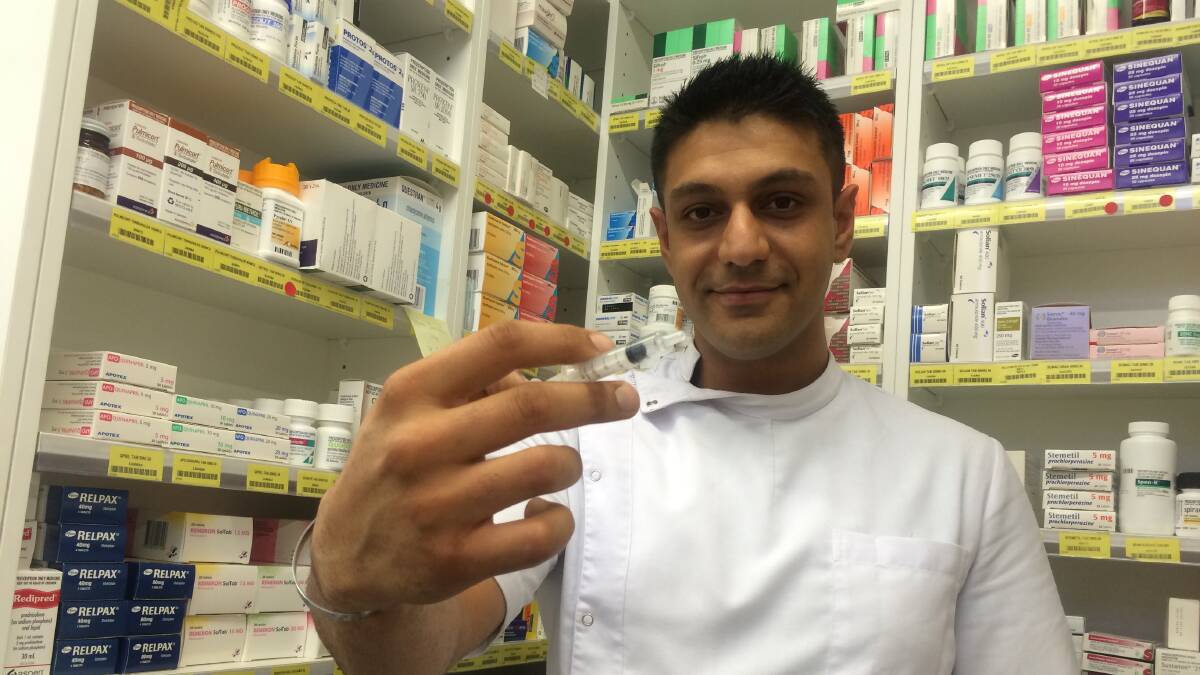 Wagga pharmacist Sunny Singh throws his support behind Labor's plan to allow trained pharmacists to administer flu vaccines. Picture: Ella Smith