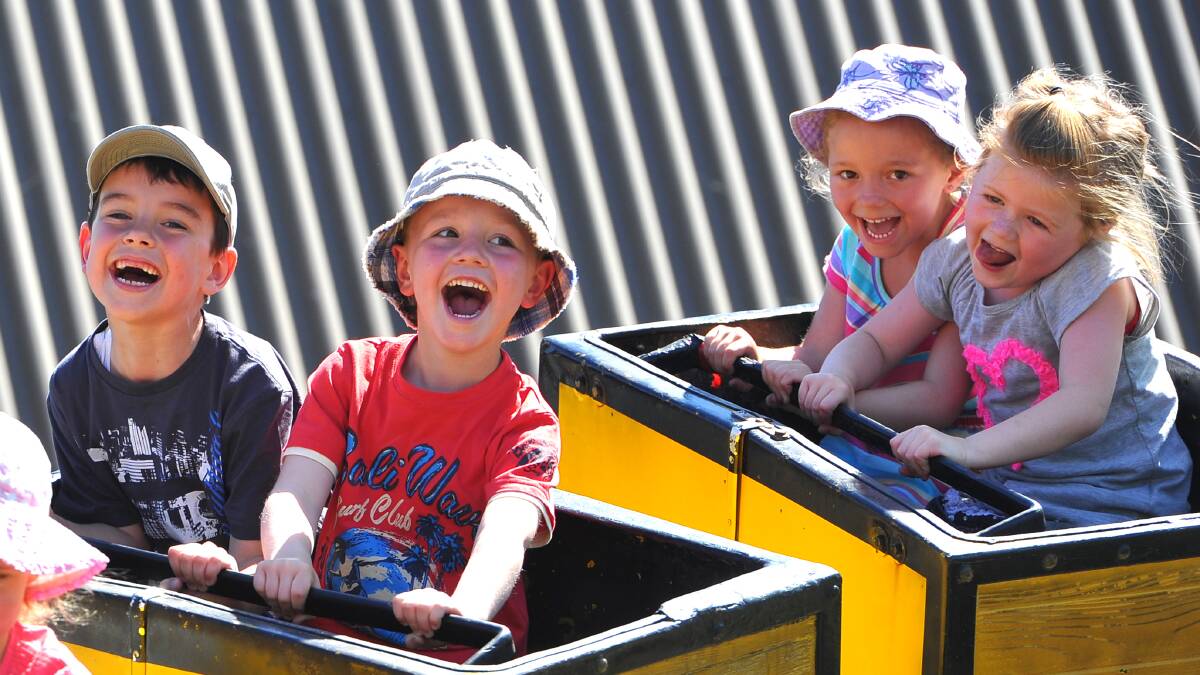 BUNDLES OF FUN: Cody Holmes, Oscar Tooze, Charlie Tooze and Henrietta Hand have the ride of their lives at the 2013 Little Big Day Out.