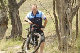 PUSHING THE PEDAL: Phil Egan, president of the Bathurst Cycling Club, at Bathurst Bike Park, where a round of the Evo Cities Mountain Bike Series will take place in May. Photo: CHRIS SEABROOK 	122214cbikes1b