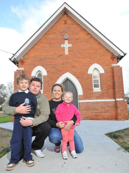 Daniel Kearnes (centre left) and Amanda Eastment (centre right) will be the first couple to get married at the new Quintessential Chapel in Uranquinty, which the couple's children Caleb, 5, (left) and Emily, 2 (right), will attend. Picture: Laura Hardwick