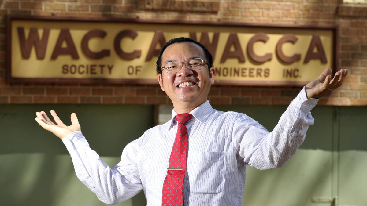 HAPPY IN WAGGA: Dr Zhixian 'George' Yi loves everything about Wagga. After living here for just three years, he says it's one of the best places in the world to live. Picture: Les Smith