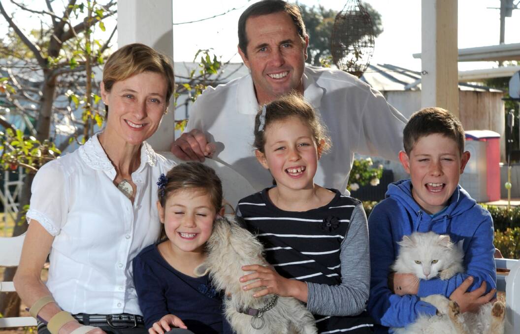 Kim and Geoff Hunt with their children Phoebe, Mia and Fletcher in 2013. Picture: Les Smith