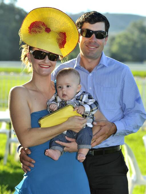 Sonia and Rob Barron of Coolac with their five-month-old son Riley at the Gundagai Cup. Picture: Les Smith

