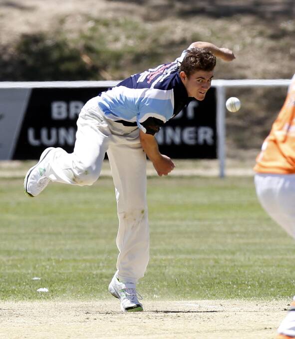 DELIVERY STRIDE: South Wagga allrounder Mick Mattingly fires in a ball during the Blues' win over Wagga RSL on Saturday. Picture: Les Smith