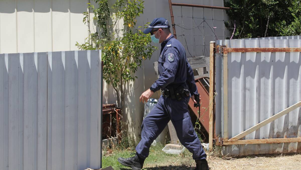 Police had attended the Corowa home for a welfare check. Entry was forced and the mother was found bathing while her dead son was wrapped up and in a freezer. 