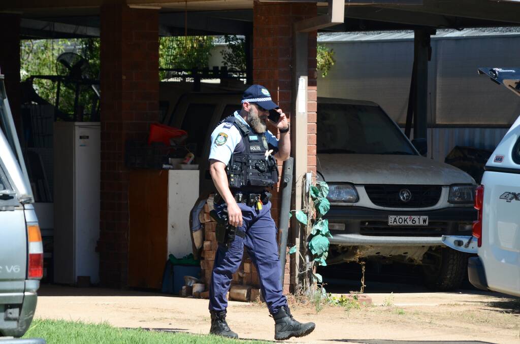 Police had attended the Corowa home for a welfare check. Entry was forced and the mother was found bathing while her dead son was wrapped up and in a freezer. 