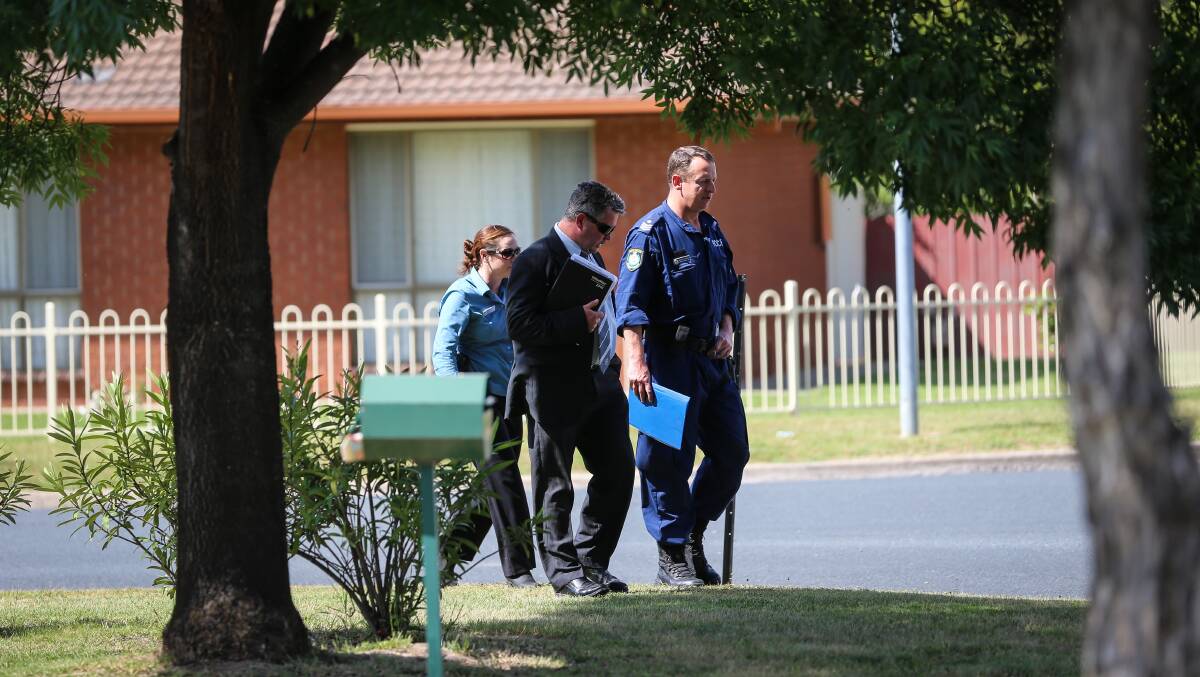 INVESTIGATING: Police outside a Webb Street property in November 2016, following the death of Lloyd Kennedy. Azzi was found guilty of manslaughter. 