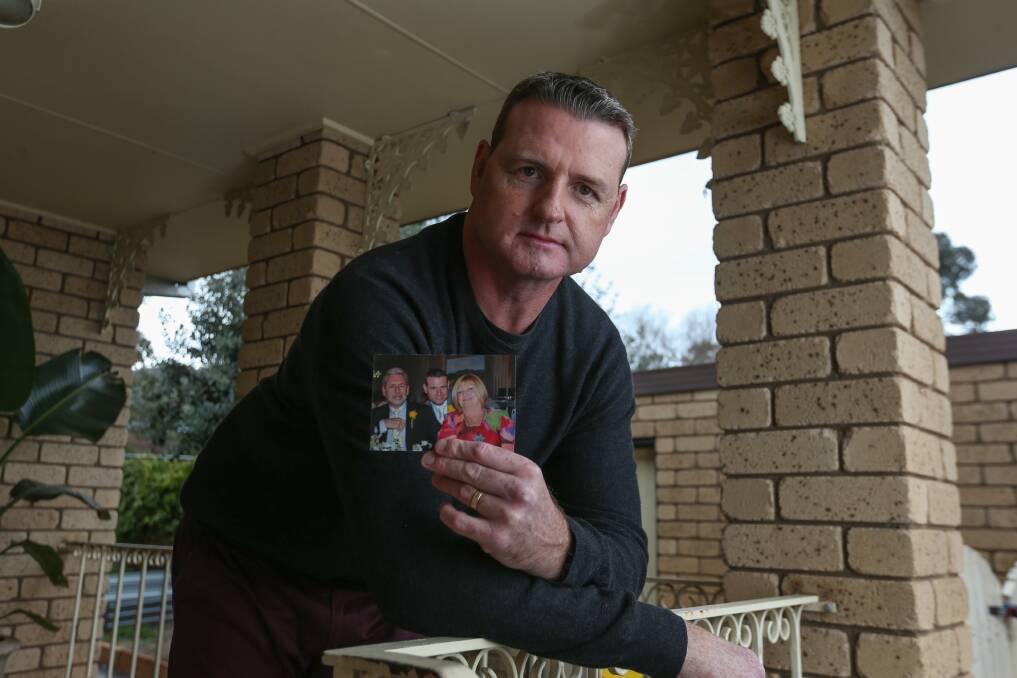 COMMON SENSE NEEDED: Shannon Barber, with a photo of his parents, was turned away from the Mercy hospital at the weekend due to being a Victorian resident. The decision was overturned on Monday. Picture: TARA TREWHELLA