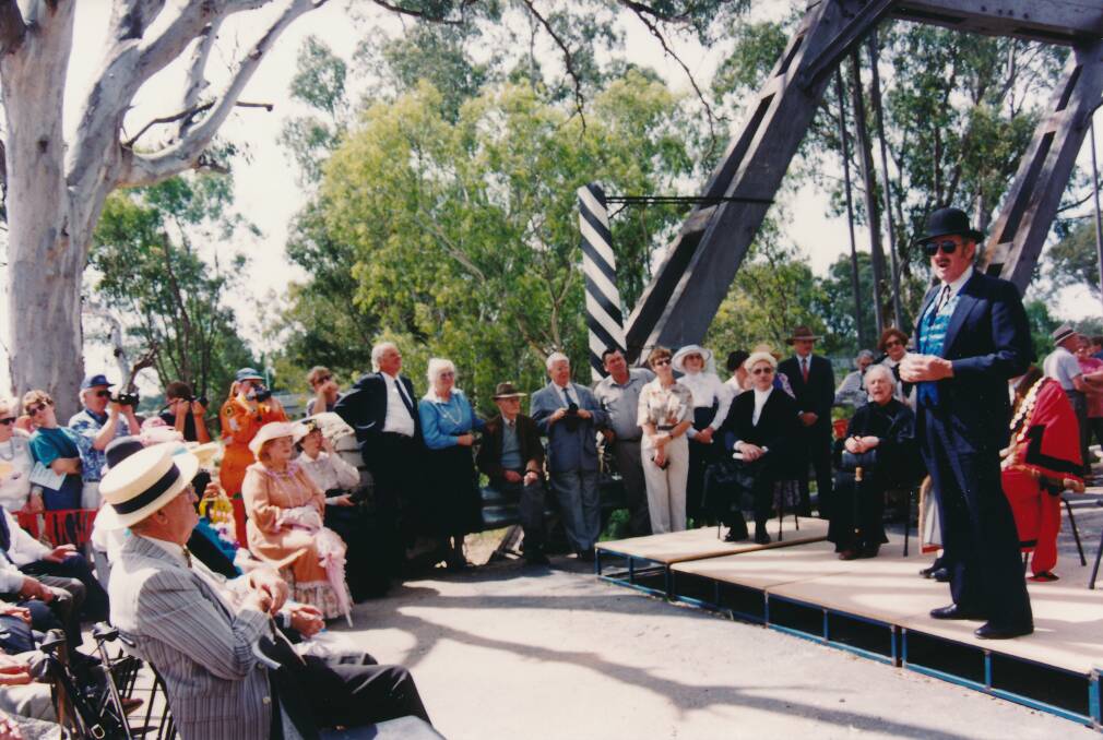 CELEBRATE: A re-enactment of the opening ceremony was held on November 11, 1995, to celebrate the 100th birthday of the Hampden bridge, with Joe Schipp MP seen here addressing the crowd. Photo: Sherry Morris collection