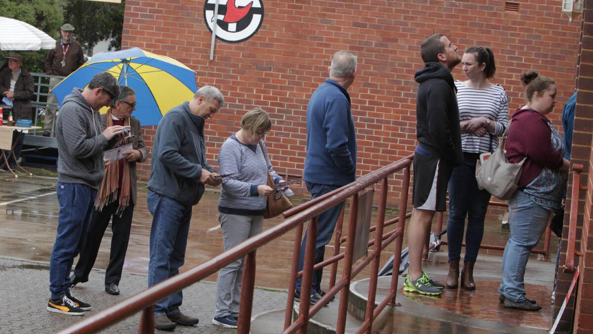Locals brave the rain to vote in the council election 