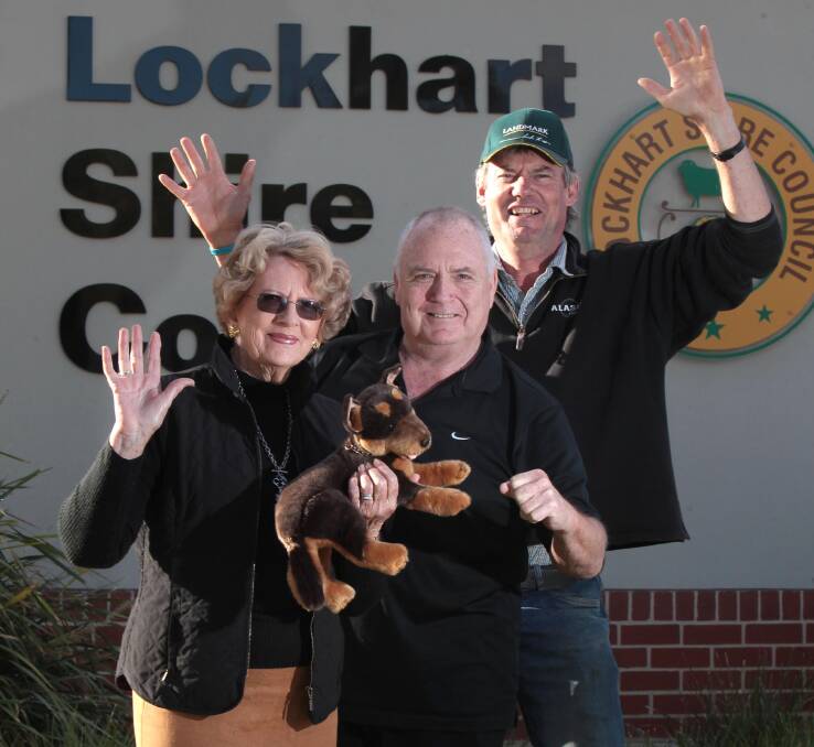Myra Jenkyn, Jeff Nimmo and Philip Bouffler celebrate Lockhart's indpendence.