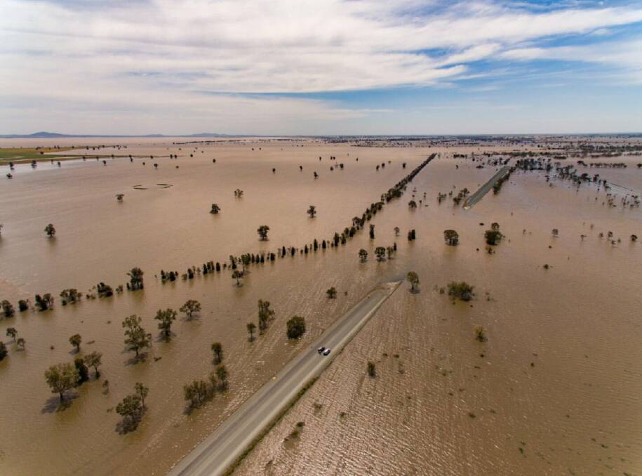 WATER, WATER, EVERYWHERE: Floodwater covers a section of the Newell Highway near West Wyalong. The highway is closed in both directions.