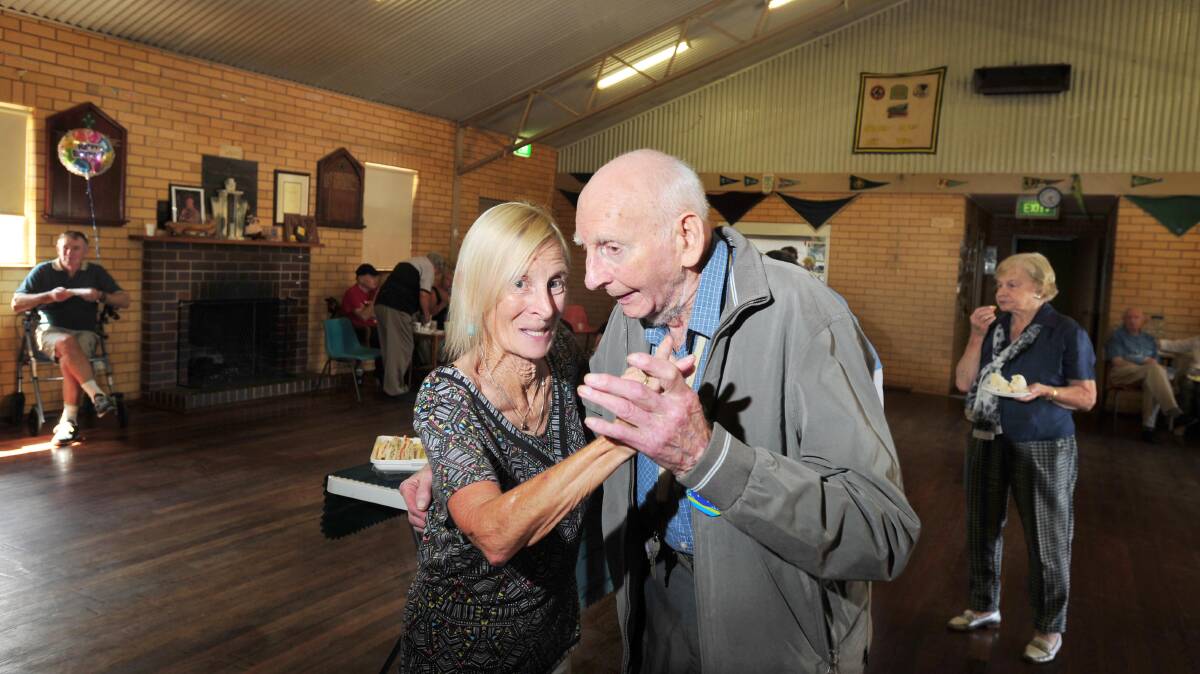 Ninety-five-year-old Horis Jenkins enjoys a dance with his daughter Sue Benfell at the Glenfield Park Scout Hall. Mr Jenkins has been dancing for more than 60 years and has no plans to hang up the boots. Picture: Kieren L Tilly