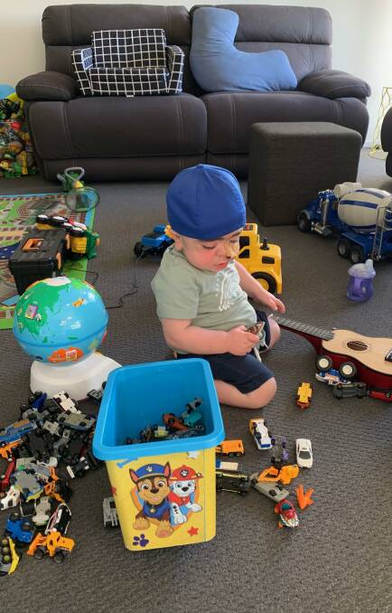 PLAY TIME: Little Henley is keen to get back into his toy box. Picture: Contributed