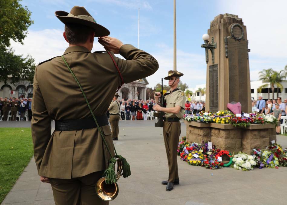 RESPECT: Current-serving soldiers form the catafalque party, punctuating the service to commemorate fallen diggers and returned servicemen on Anzac Day in 2018. Picture: Les Smith