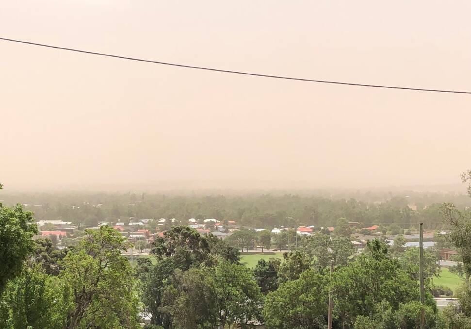 Wagga's sky has turned red as dust rolls through the city. Picture: Ross Tyson