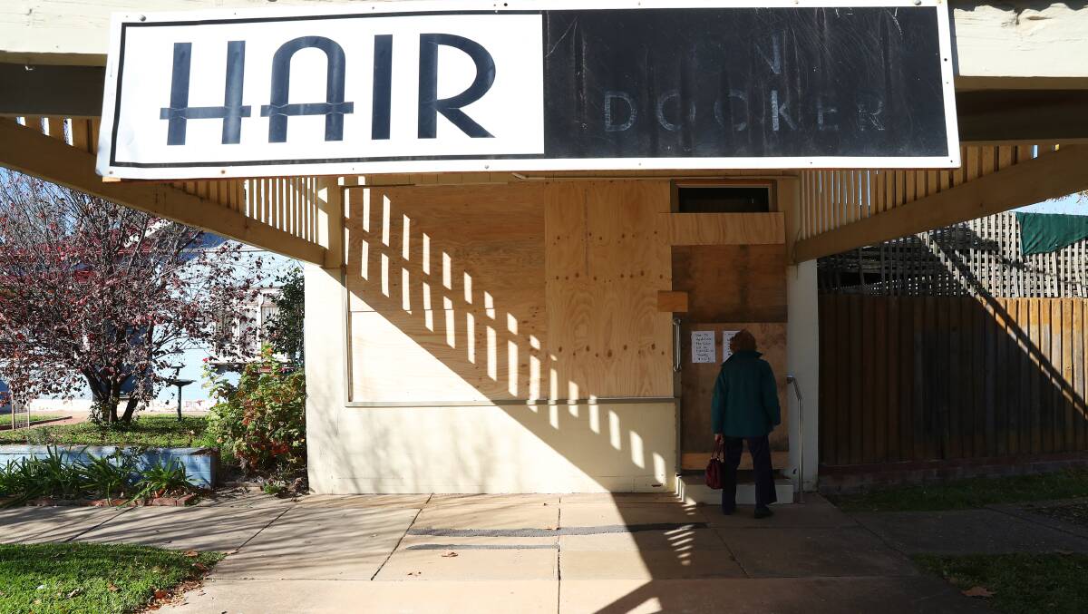 DESTROYED: A Hair on Docker client arrived at the store on Tuesday for an appointment, met instead with a boarded up building after staff were unable to get in touch to reschedule. Picture: Emma Hillier