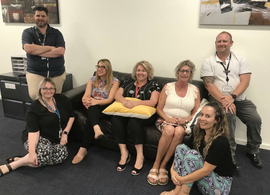 WORKING TOGETHER: Wagga's Corrective Services staff, including Gavin Comtesse, Korie Buck, Hanna McGinty, Tracee Breen, Fiona Flynn, Dimity Hemphill and Brett Kingwill, celebrate their hard work. Picture: Jessica McLaughlin