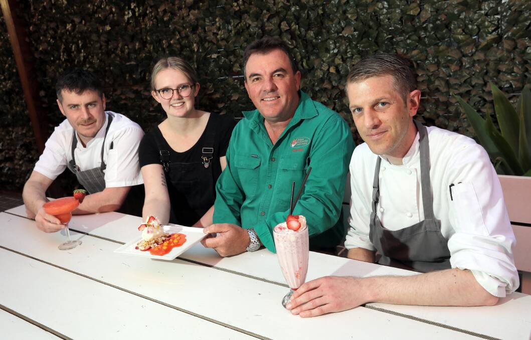 Devour's Michael Cashen with Romano's staff August Robertson and chefs Robbie Power and Brian Broderick. Picture: Les Smith