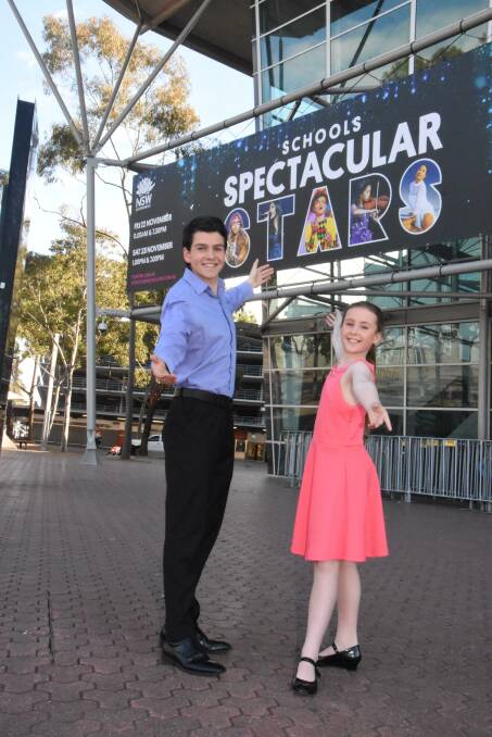 RISING STARS: Edward Prescott from year 11 and Jazmin Castle from year 5 get rehearsing ahead of November's Schools Spectacular show. Picture: Contributed